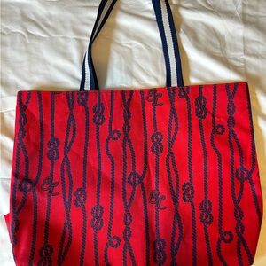 Estee Lauder nautical rope knot tote bag in red and navy blue.